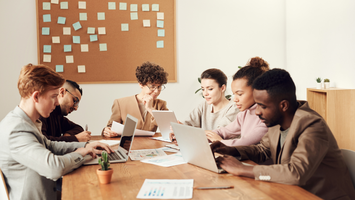 Concierge welcoming guest with a smile